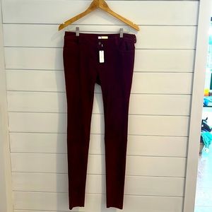 Burgundy suede washable skinny jeans.